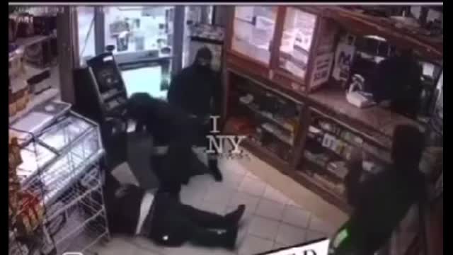 Guy gets knocked out cold in an  store in NYC