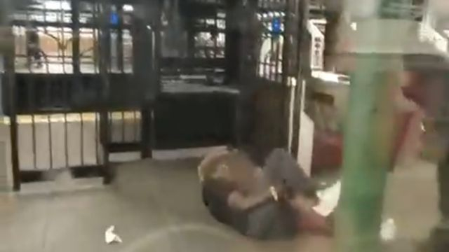 Woman beaten by homeless person at the subway station